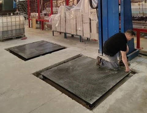 Plataforma de pesaje en taller durante mantenimiento